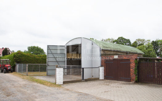 Obj.: 320 / Kompakte Leichtbauhalle mit großem Tor – ideal für sperriges Lagergut!